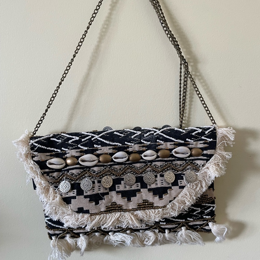 Adorable boho clutch by Express